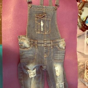 Distressed overall jeans